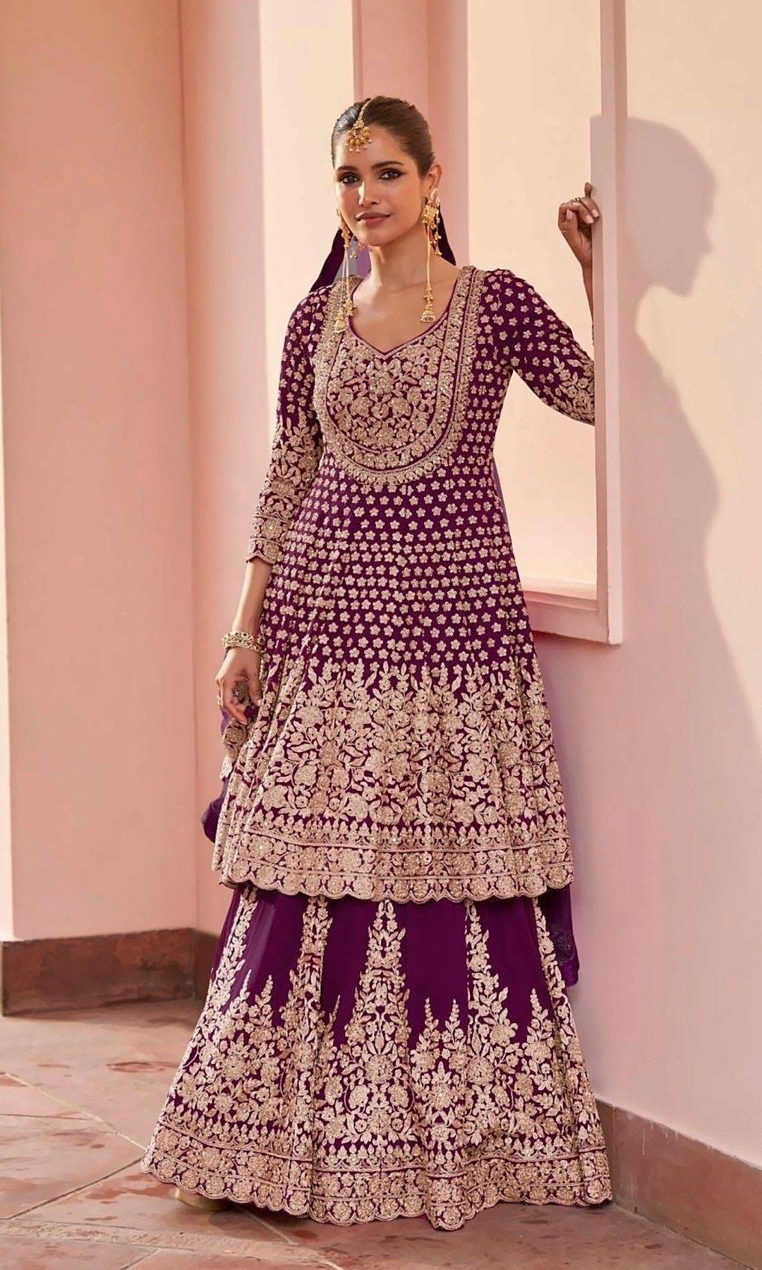 Wine Anarkali Lehenga Set — Wine-purple anarkali with a sweetheart yoke and dense gold embroidery, layered over a matching embroidered lehenga with dupatta.