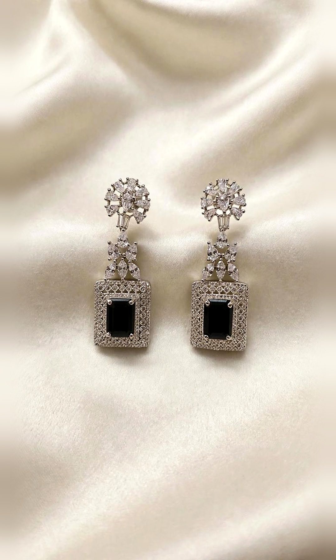 Black Stone Diamond-Look Earrings — Silver-tone drops with a floral diamond-look stud and an emerald-cut black stone framed in pavé.