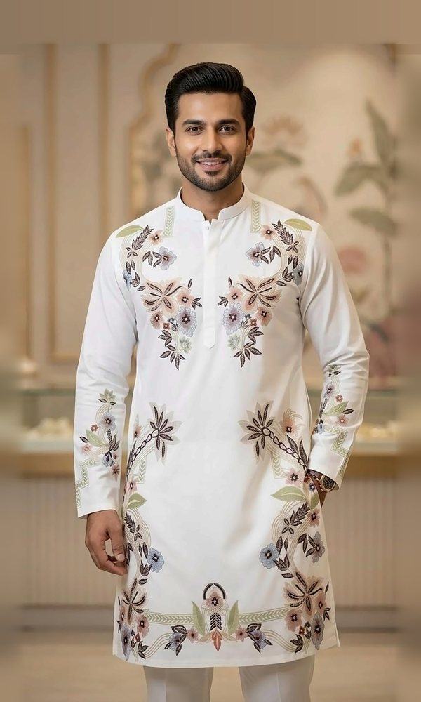 Ivory Floral Embroidered Kurta — Crisp white kurta with pastel floral embroidery framing the placket, sleeves and hem — fresh and elegant for day functions.
