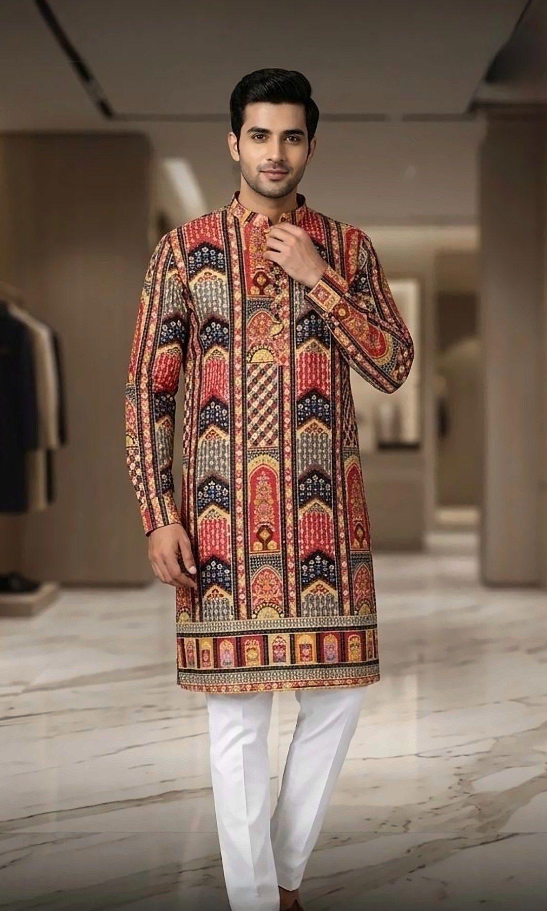 Multicolour Heritage Print Kurta — Bold red, navy and mustard heritage-print kurta with arch and chevron motifs and a printed border, styled with white trousers.