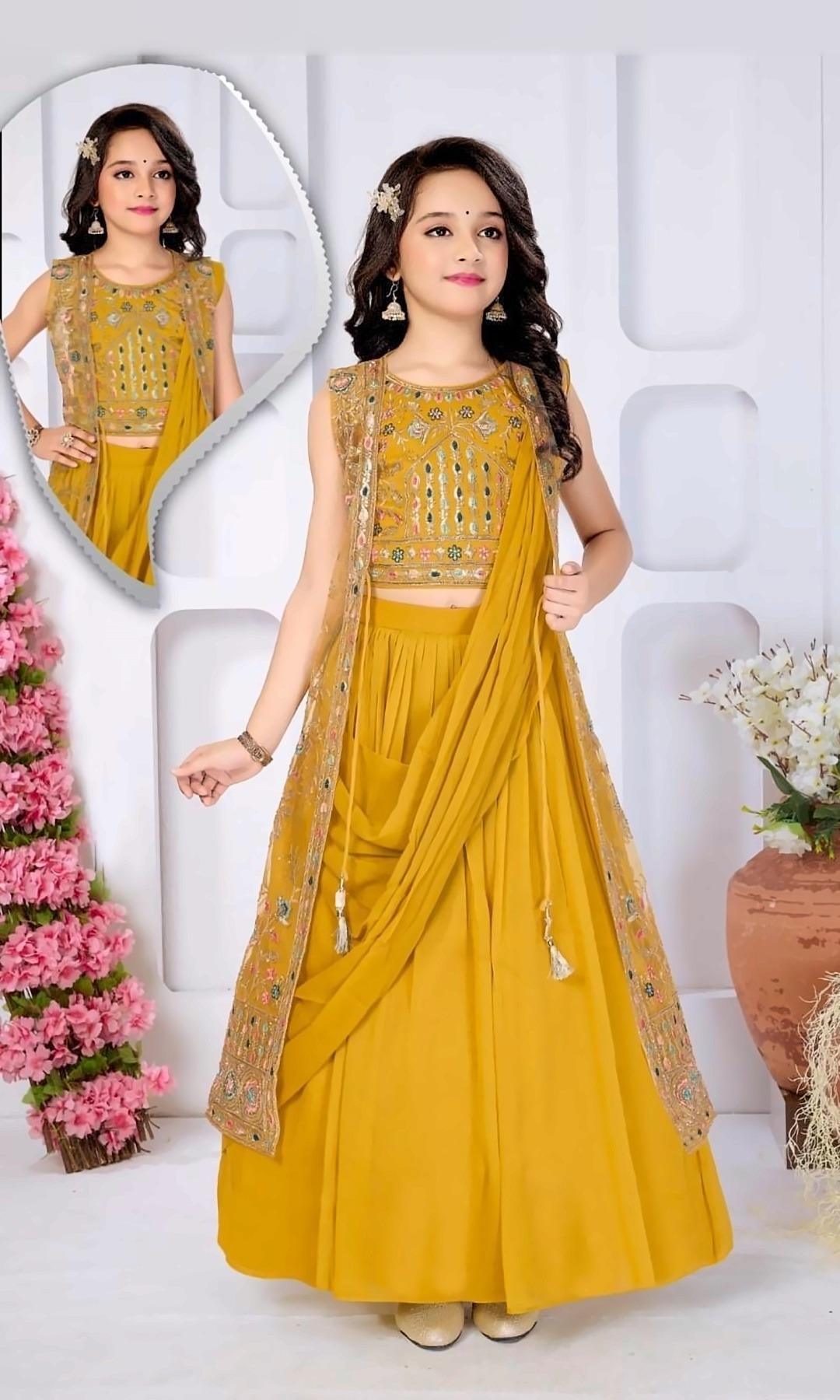 Mustard Lehenga with Long Jacket — Mustard embroidered crop top and lehenga with a long net jacket and an attached draped dupatta.