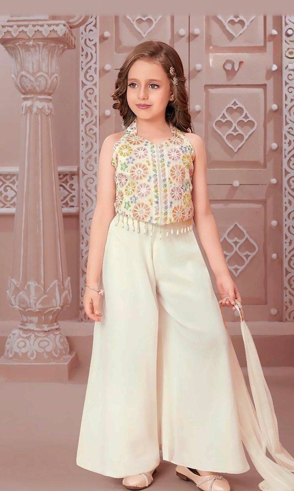 Ivory Mirror-Work Palazzo Set — Ivory halter-neck crop top in pastel mirror and thread embroidery with pearl-drop tassels, paired with wide ivory palazzo and a soft net dupatta.
