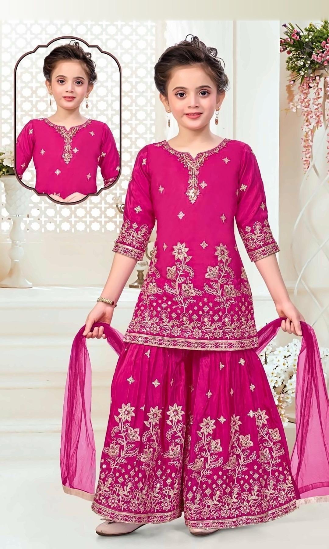 Rani Pink Embroidered Sharara Set — Rani pink kurti with gold zari embroidery and sequin butis, a fully embroidered sharara and a soft net dupatta.