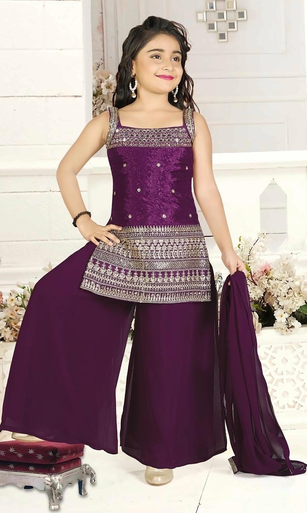 Wine Embroidered Palazzo Set — Wine jacquard kurta with a mirror-work neckline and a gold embroidered hem, a matching palazzo and a dupatta.