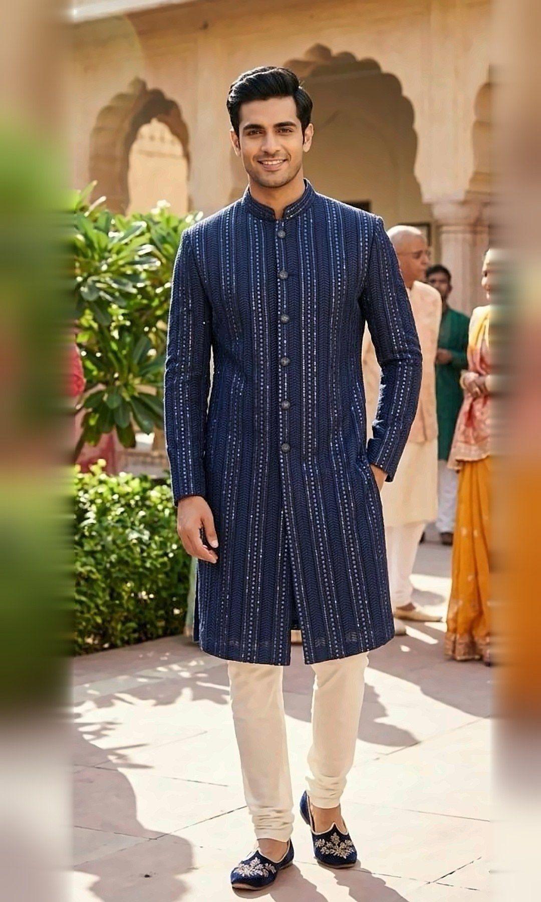 Navy Sequin Stripe Sherwani — Navy achkan-style sherwani with a tonal chevron weave and fine sequin stripes, paired with ivory churidar.