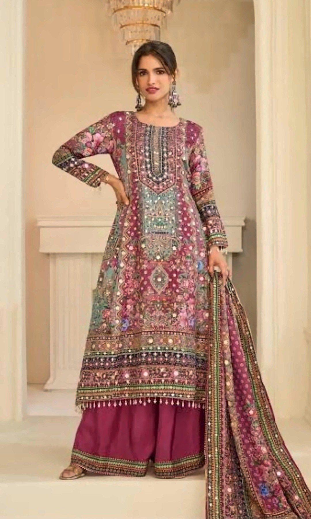 Magenta Mirror-Work Palazzo Suit — Magenta floral print with mirror-work yoke, tasselled hem, wide palazzo and a matching printed dupatta. Unstitched suit set.
