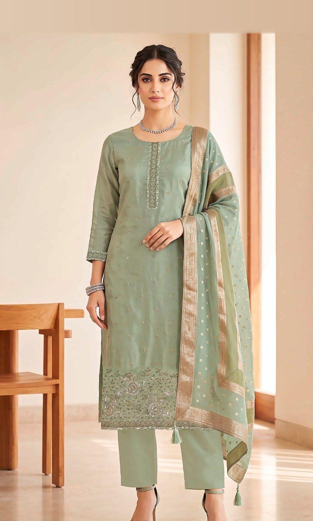 Sage Green Rose-Embroidered Suit — Soft tissue-silk suit with a sequinned placket, rose-embroidered hem and a woven zari-border dupatta. Unstitched suit set.