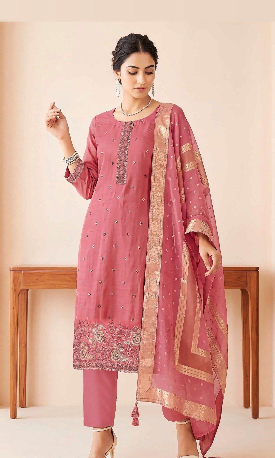 Rose Pink Rose-Embroidered Suit — Soft tissue-silk suit with a sequinned placket, rose-embroidered hem and a woven zari-border dupatta. Unstitched suit set.