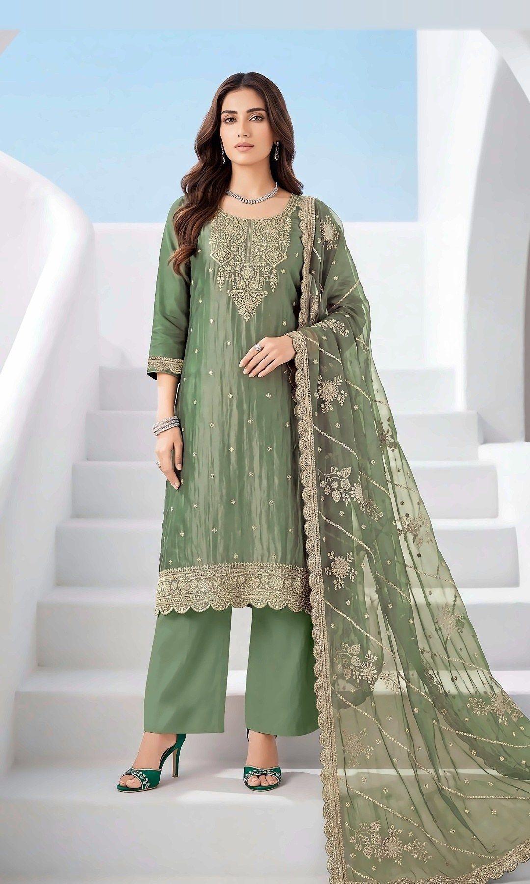 Olive Green Tissue Silk Embroidered Suit — Shimmering tissue-silk suit with a rich embroidered yoke, scalloped hem and a sequin-striped scalloped dupatta. Unstitched suit set.